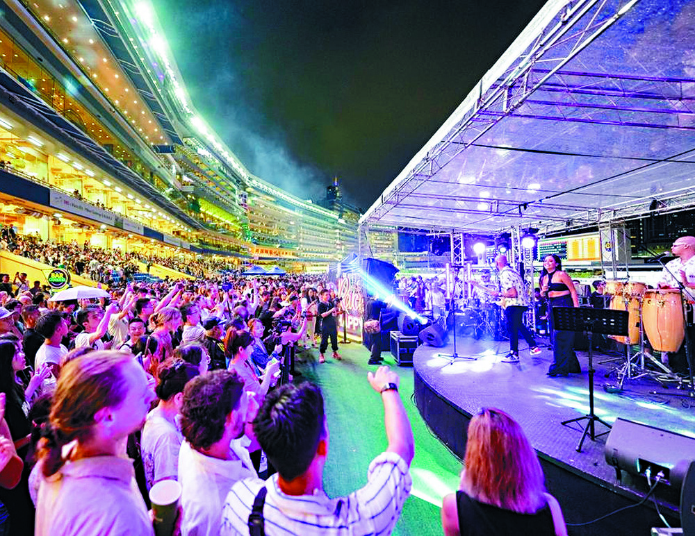 A Happy Wednesday event gets the crowd rocking at Happy Valley last year. SING TAO