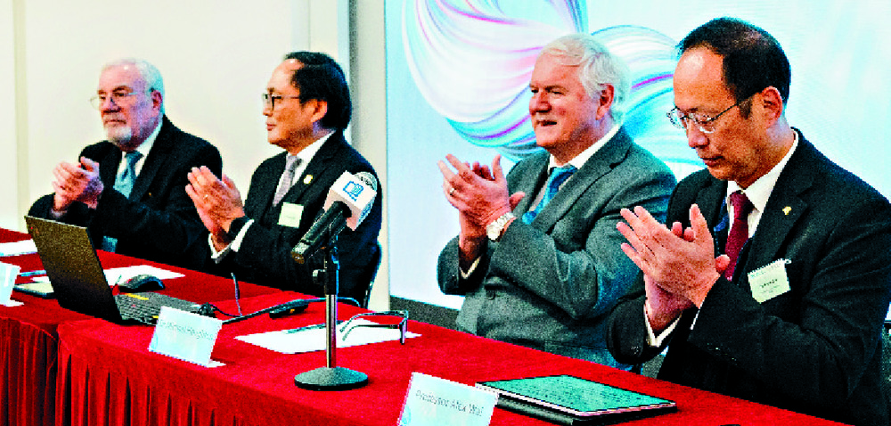 Pushing for HKBU are, from left, Robert Spiegel, Manson Fok, Michael Houghton and Alexander Wai. SING TAO